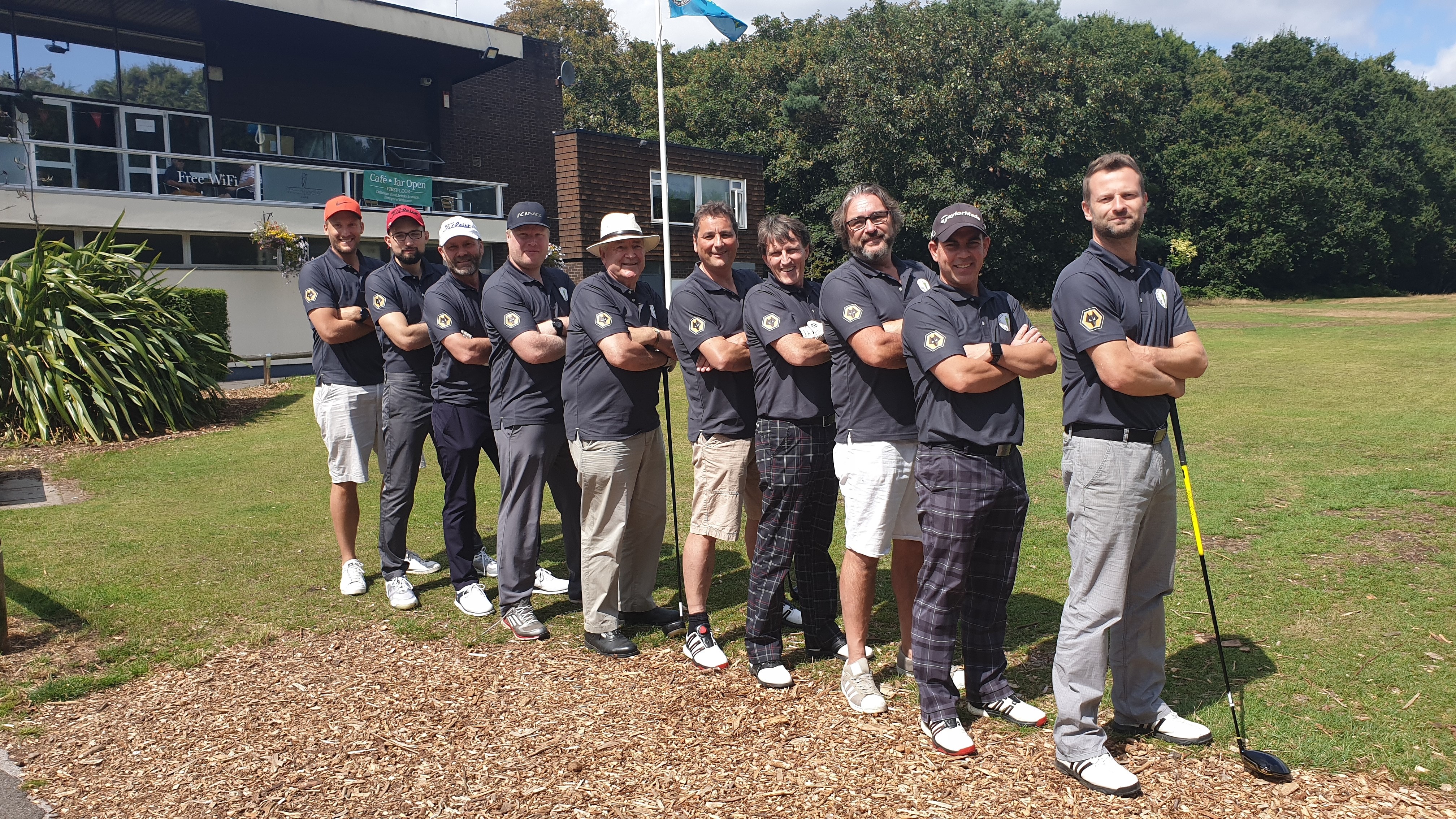 Golfers lined up on the course
