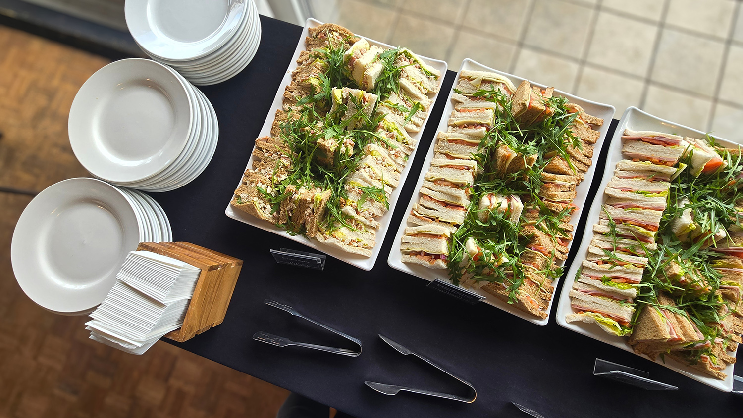 Selection of sandwiches on large rectangular plates.