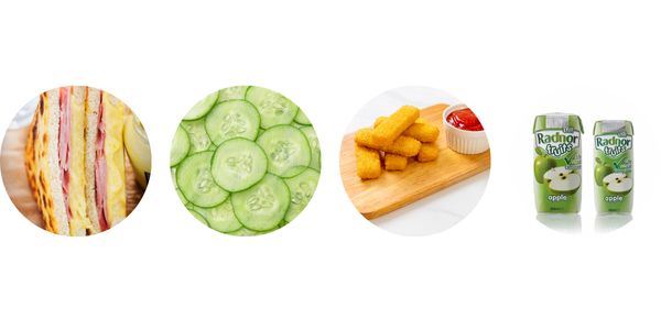 Cheese and ham toastie, cucumber slices, fish fingers with ketchup, kids' appl juice cartons